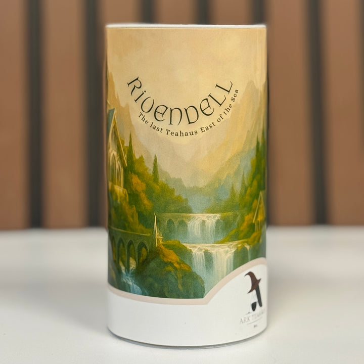 Cylindrical product packaging with a scenic design and 'Rivendell' branding on a neutral background.