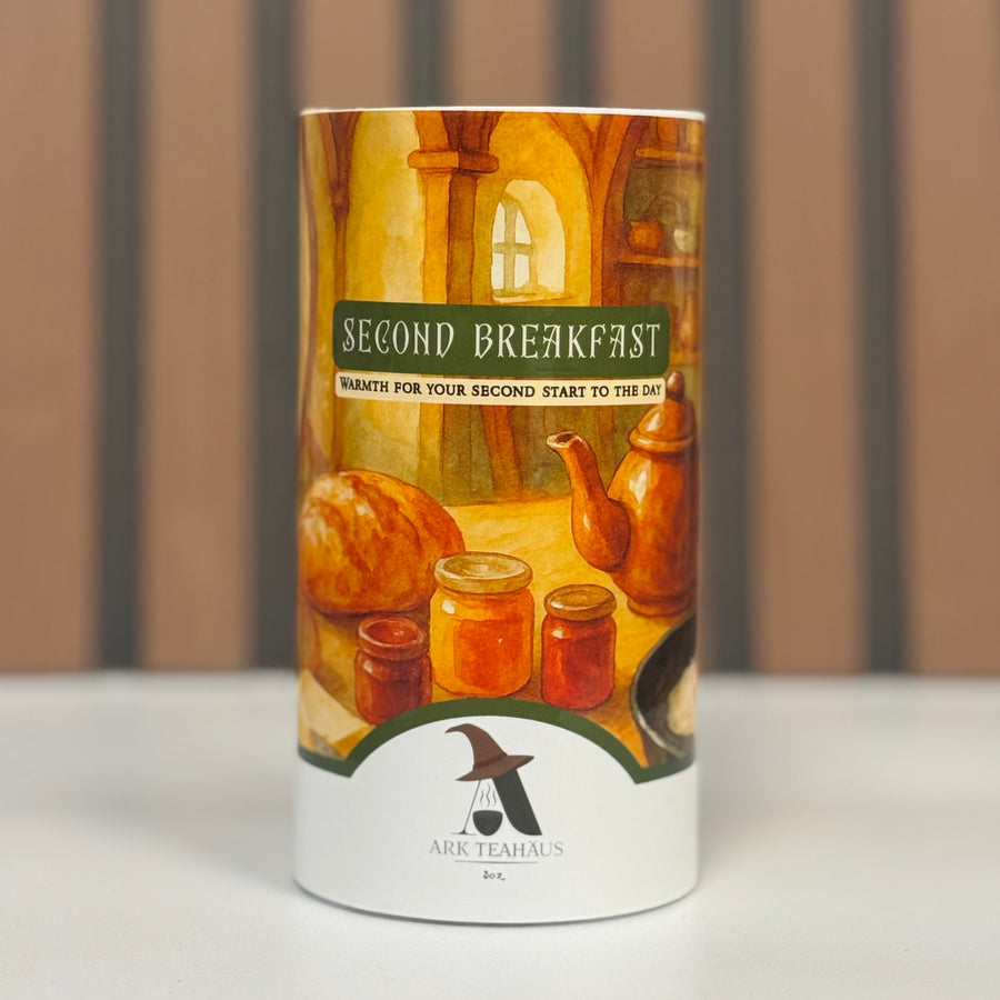 Canister labeled 'Second Breakfast' with a vintage-style design on a neutral background
